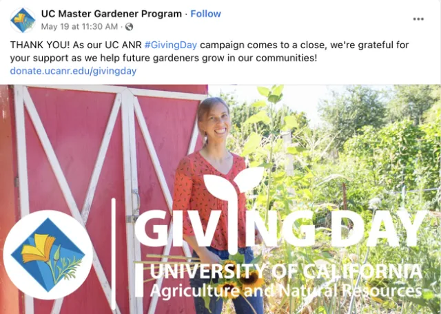 Master Gardener thank you for Giving Day. Woman standing in front of a red barn and plants.