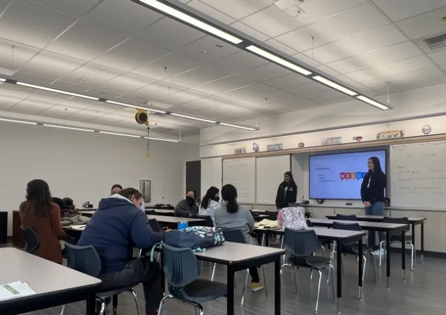 Auyeung leads introductions for one of her classes.