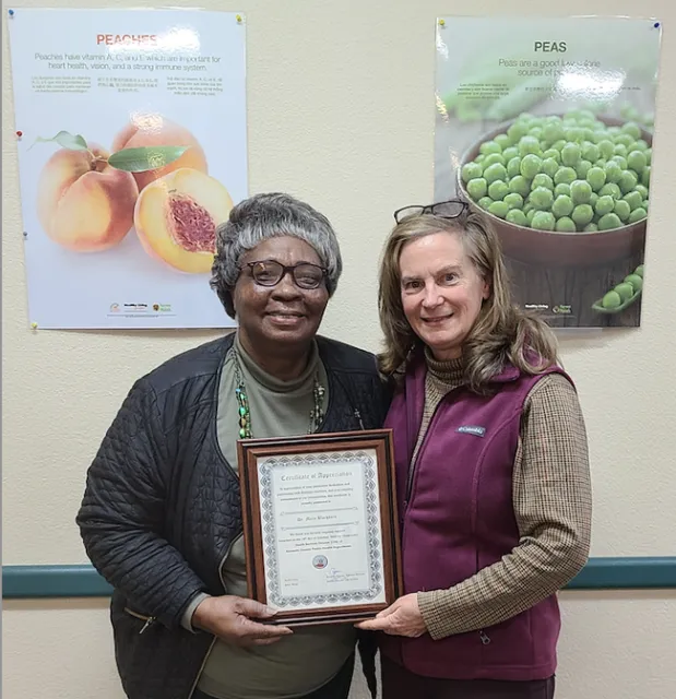 Mary Blackburn received a certificate of recognition from Alameda County's Annette Laverty.