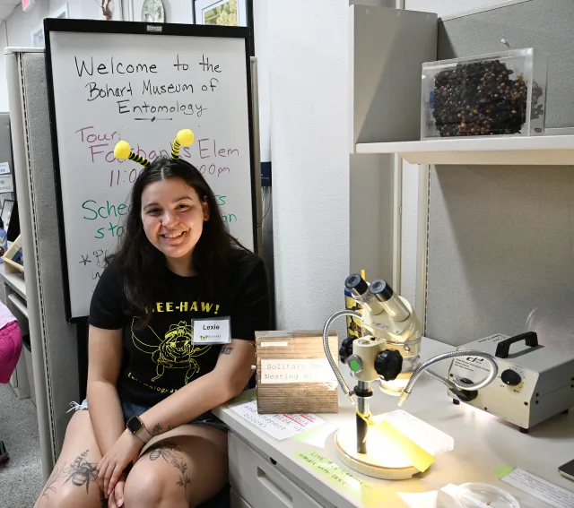 UC Davis doctoral candidate Lexie Martin answers questions at the Bohart Museum of Entomology open house. (Photo by Kathy Keatley Garvey)