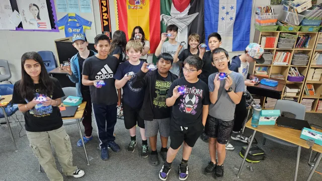 Youth showing off their micro:bit projects