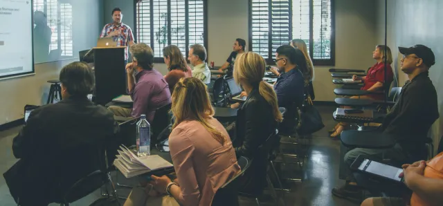 Teacher and students in classroom.