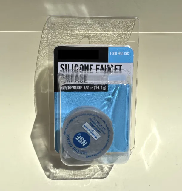 A small container of silicone grease inside of blister packaging.