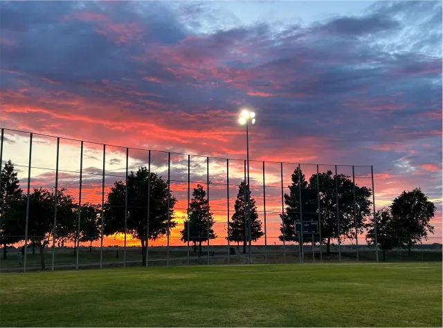 Colorful sunset at a ballfield