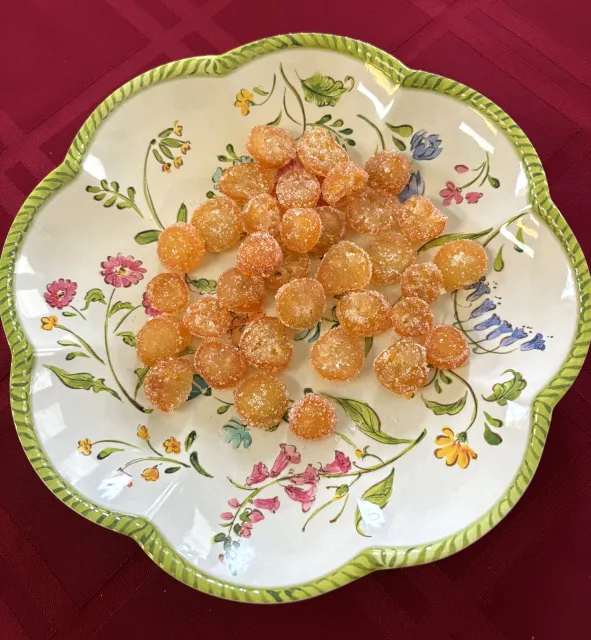 A floral plate with candied kumquats