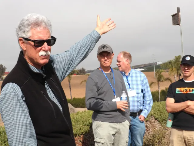 Man talking to a group of people