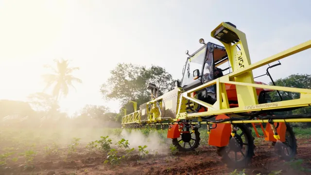 An AI-powered, tractor-mounted lettuce thinner identifies individual plants and automates thinning and beneficial applications