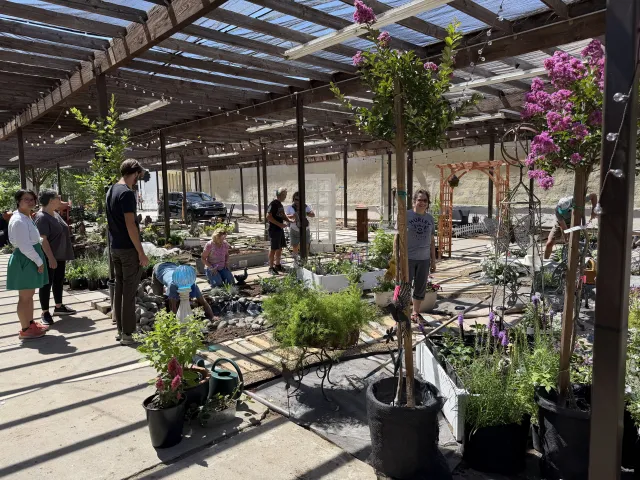 Nine Master Gardener Volunteers building the 2026 Demonstration Garden at the Merced County Fair in June 2026