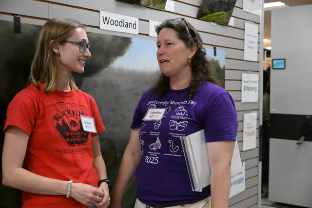 Tabatha Yang, Bohart Museum of Entomology's education and outreach coordinator, chats with doctoral candidate Grace Horn.