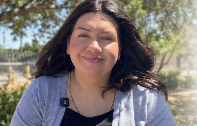 Administrative Assistant Andrea Arellano reflects on how South Coast REC serves and connects with the community during its 70th anniversary celebration. Photo: Diana Cervantes.