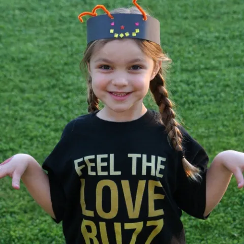 BEE CRUSADER--Katie Brown, 6, of Phoenix, Ariz., loves bees and just donated $20 from her allowance savings to the UC Davis honey bee research program.