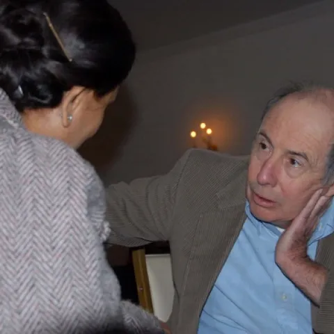 DEDICATION--Entomologist Bruce Hammock,a distinguished professor at UC Davis, confers with a researcher at a recent meeting of the Entomological Society of America. Hammock holds a joint appointment in Cancer Research with the UC Davis Medical Center. He directs the National Institute of Environmental Health Sciences (NIEHS) Superfund Program on the UC Davis campus, as well as the National Institutes of Health (NIH) Training Program in Biotechnology, and the NIEHS Combined Analytical Laboratory.(Photo by K