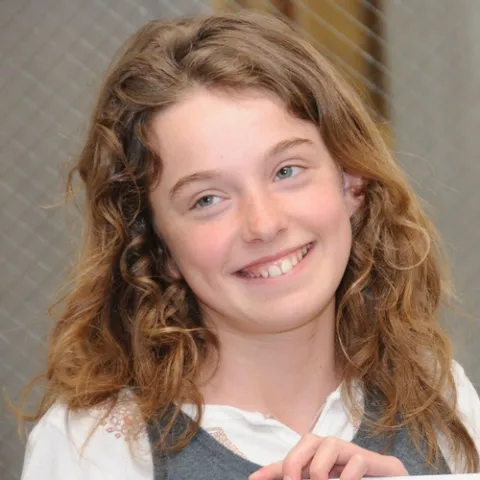 BEE PROJECT--Bay Area resident Sheridan Miller raised $733 to help bee research at the Harry H. Laidlaw Jr. Honey Bee Research Facility at UC Davis. (Photo by Kathy Keatley Garvey)