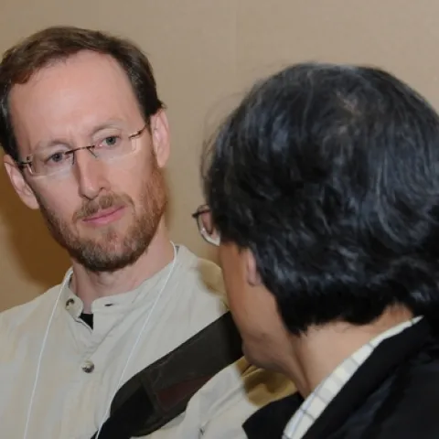 JAY ROSENHEIM, shown here talking to a colleague at a meeting of the Entomological Society of America, is a newly elected Fellow of the American Association for the Advancement of Science. He joined the UC Davis Department of Entomology faculty in 1990. (Photo by Kathy Keatley Garvey)