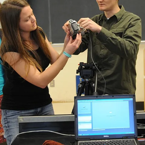 ENTOMOLOGY GRADUATE STUDENTS Amy Morice and James Harwood check out a camera. They were among the students in James R. Carey's class on "How to Make an Insect Collection." The video clips are now posted on the UC Davis Department of Entomology website. (Photo by Kathy Keatley Garvey)