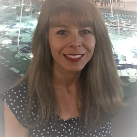 Claudia F. Carlos