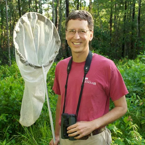 Nick Haddad in the field. (Photo by Melissa McGaw)