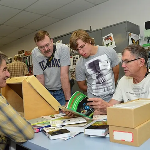 Dragonfly expert Rosser Garrison (far right) leads a discussion. From left are Bohart associate Greg Kareofelas; Bob Stahmer of Stockton, a UC Davis alumnus; and UC Davis entomology graduate student Ziad Khouri, who studies with Bohart director/UC Davis professor Lynn Kimsey. (Photo by Kathy Keatley Garvey)