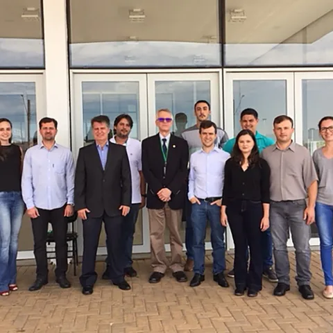 The Asian Citrus Psyllid Team: Scientists in the front row (from left) are Tatiana Mulinari, Rodrigo Magnani, Antonio Juliano Ayres, Walter Leal, Marcelo Miranda, Victoria Esperanca, Odimar Zanardi, and Rejane Luvizotto. The three scientists in back are Haroldo X. L. Volpe (white shirt) Renato de Freitas and Rômulo Carvalho.