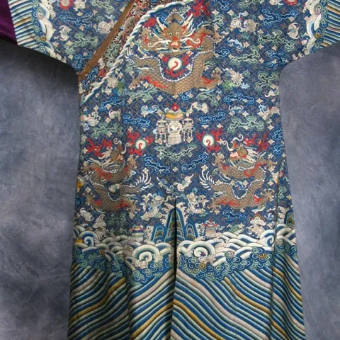 This is one of the displays at the art-and-design exhibition: a dragon robe, from the late 19th Century, China. It is 100 percent silk with tapestry motifs. (Gift of Susan Schwartz, JoAnn C. Stabb Design Collection.)