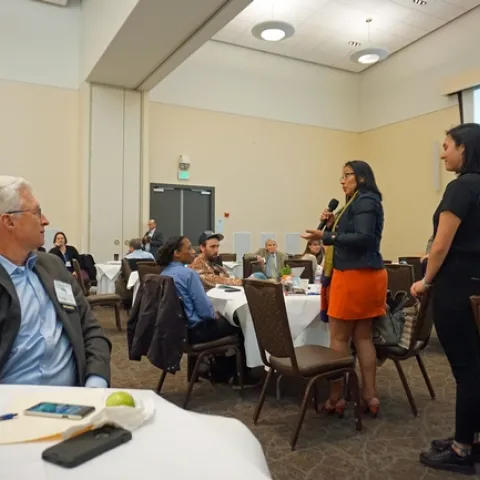 Director of the California Department of Pesticide Regulation, Brian Leahy, listens as an IPM Summit participant shares ideas.