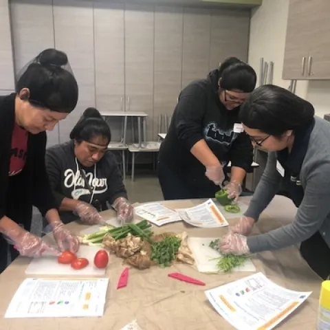 Parents putting their knife skills to the test.