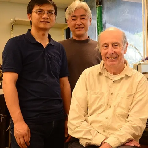 Bruce Hammock (right) with Hammock lab researchers Jun Yang (far left) and Sung Hee Hwang; all are with the UC Davis Department of Entomology and Nematology and the UC Davis Comprehensive Cancer Center. (Photo by Kathy Keatley Garvey)