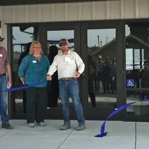 From left, Mark Lagrimini, vice provost of research and extension, and AVP Wendy Powers joined IREC director Rob Wilson for the ribbon cutting of IREC's new multipurpose conference and lab building.