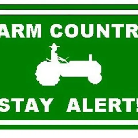 Farm country stay alert! Green sign