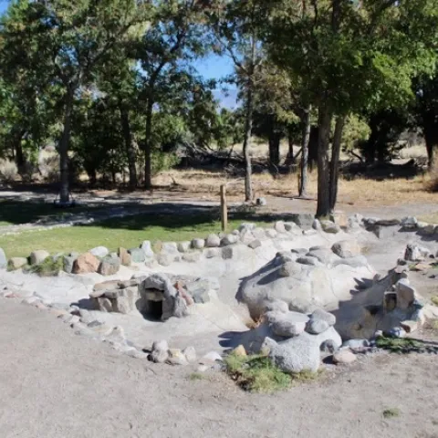 A reconstructed barracks garden with pond