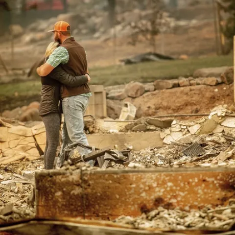 Chris and Nancy Brown embrace while searching through the remains of their home, leveled by the Camp Fire in Paradise, California
Noah Berger/AP