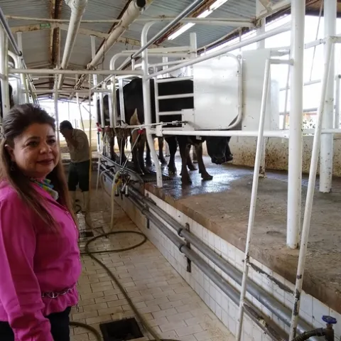 Director Christina shows off the double-4 herringbone parlor at UABC