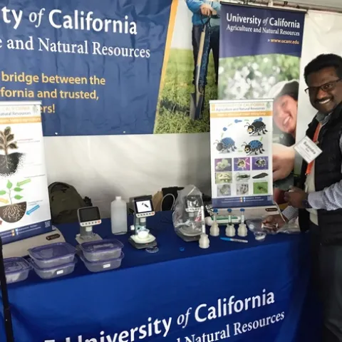 UCCE entomology and biologicals advisor Surendra Dara, shown at a display at the World Ag Expo, was the organizer of the March Ag Innovations Conference in Santa Maria.