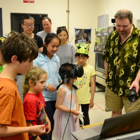 Medical entomologist Geoffrey Attardo and his "Virtual Reality Bugs" demonstration drew participants all day long at the 2018 UC Davis Picnic Day. He'll do so again this Saturday. (Photo by Kathy Keatley Garvey)