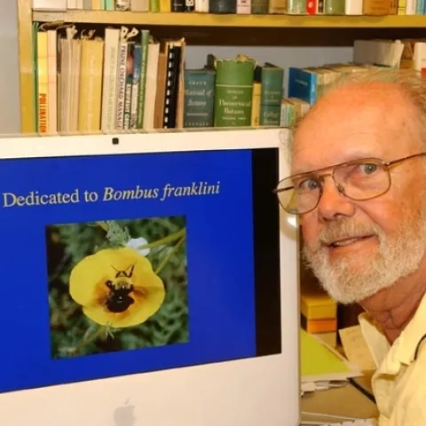 Robbin Thorp, distinguished emeritus professor of entomology, with Franklin's bumble bee, a bee he had been monitoring since 1998. (Photo by Kathy Keatley Garvey)