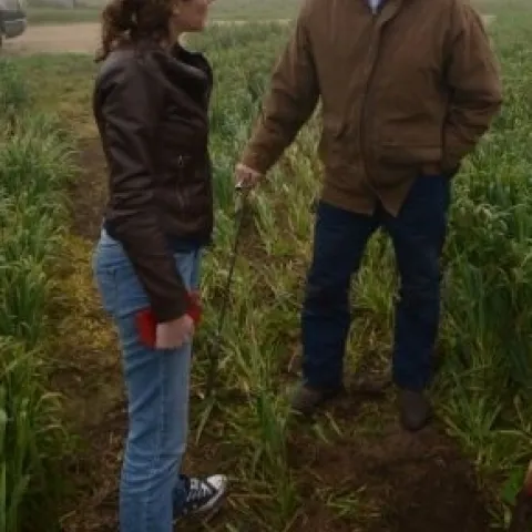 Dr. Amelie Gaudin (left) visiting the no-till dairy silage field of Turlock, CA farmer, Michael Crowell.