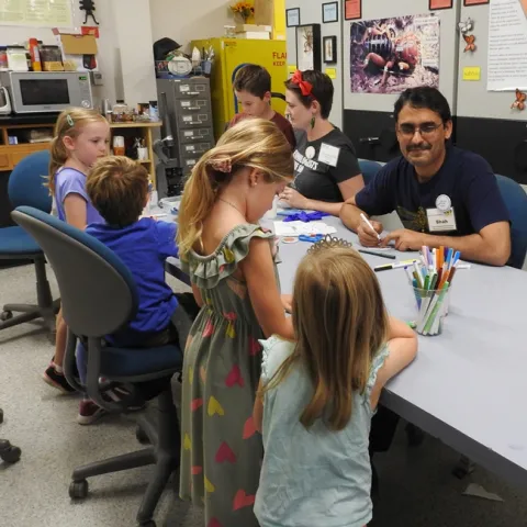 Entomologist Syed Fahad Shah, shown here Sept. 21 at the Bohart Museum open house, was robbed at gunpoint on Sept. 20. Next to him is doctoral candidate Charlotte Herbert Alberts.(Photo by Kathy Keatley Garvey)