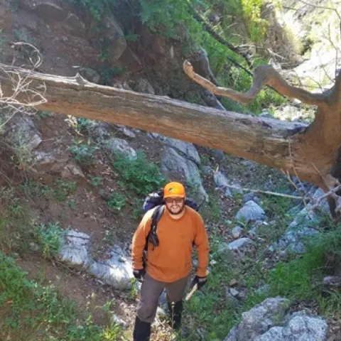 Graduate student Nathan Jumps revisiting Englewild Canyon to collect additional sediment samples. Photo by A. Gray.