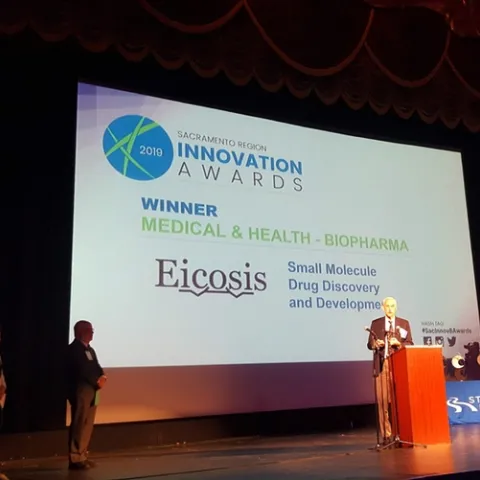 This was the scene at the Sacramento Region Innovation Awards program when EicOsis was named winner of the medical and health/biopharmaceutical category. Pictured is William Schmidt, Ph.D, in charge of clinical development for EicOsis. (Photo courtesy of Robb Wright)