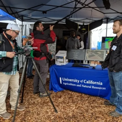 IGIS Drone Pilot and Data Analyst Jacob Flanagan speaks to the local media at the 2019 World Ag Expo