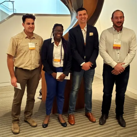 Student Contest Winners (LF to RT): Matthew Fatino, Guelta Laguerre, Drew Wolter, and James Schaeffer (Alex Ceseski not present)