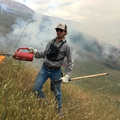 Shapero demonstrates prescribed burn. Since the Thomas Fire, prescribed fire has become more accepted as a technique to reduce vegetation and lessen the threat of catastrophic wildfire. Photo by by Robert Acquistapace