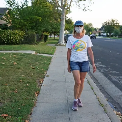 Jeannette Warnert walks wearing a homemade face mask. UC Walks is May 6. Post your UC Walks photos on social media with #UCANRmoves and #ucwalks.