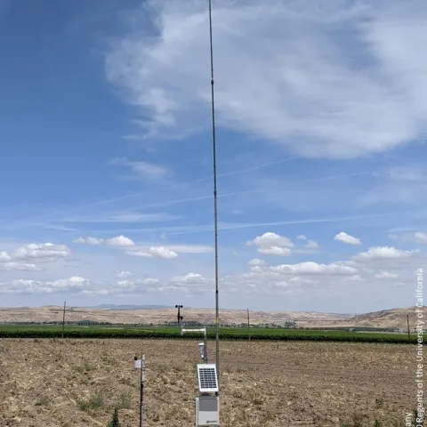 Figure 1. UCCE weather station with a 30-foot mast to measure the inversion condiitons.