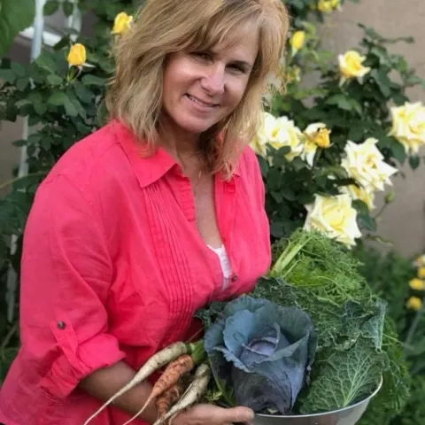 Master Gardener Debi Adams, with her harvest