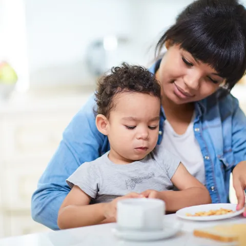 Mother and child eating