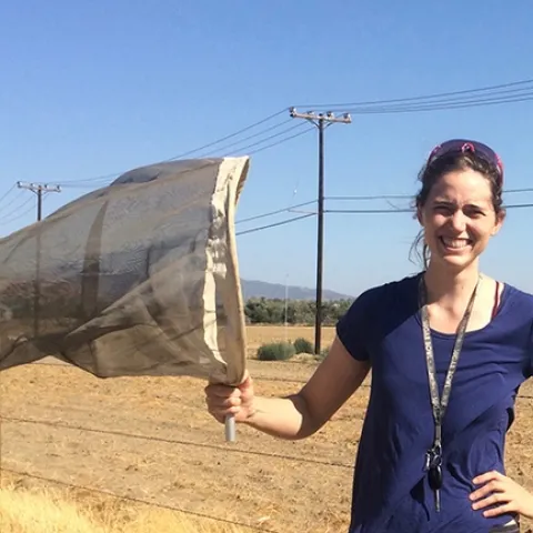 Doctoral student Erin Calfee with her collecting net.