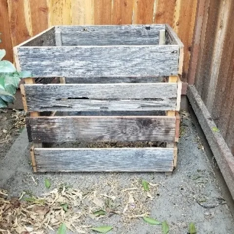 The composter my husband built out of old fence boards. (Terry Pellegrini)