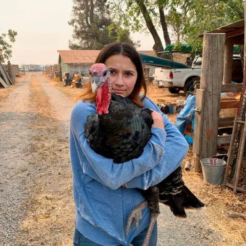 Yaxeli Saiz-Tapia says raising turkeys has raised her appreciation for where her food comes from. Photo by Shauna Aubin.