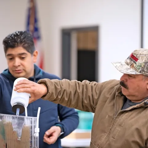 In 2019, ANR offered more than 40,000 educational events across California on topics such as drought, climate change and invasive species. UCCE specialist Sam Sandoval, left, gave soil and water management training for field workers in Spanish in 2019. Photo by Evett Kilmartin